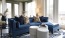 a blue couch in a room