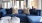 a blue couch with pillows