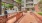a brick walkway between buildings