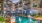 a pool in a courtyard between buildings